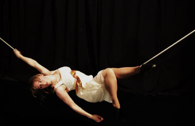 Alice lying on the slack rope